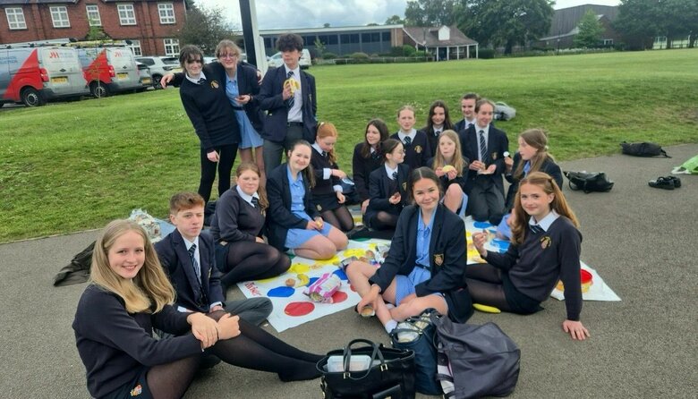 Service students enjoy Twister tangles and tasty treats